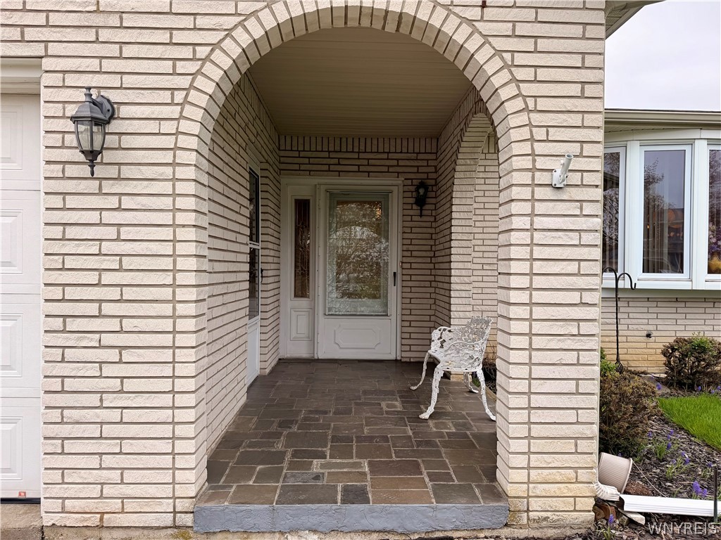 229 Wind Mill Road West Seneca, NY 14224 - Photo 2 of 49 Curved entry - look and see tile flooring