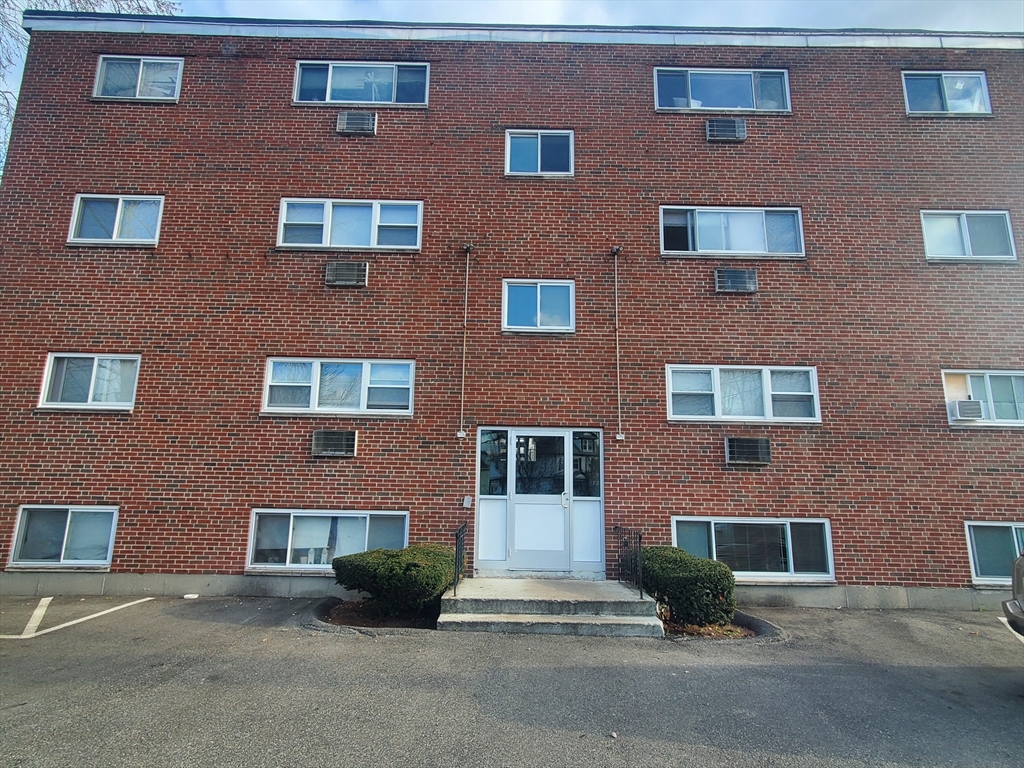4 Oakcrest Road, Unit 31 Boston, MA 02136 - Photo 12 of 12 a front view of a building