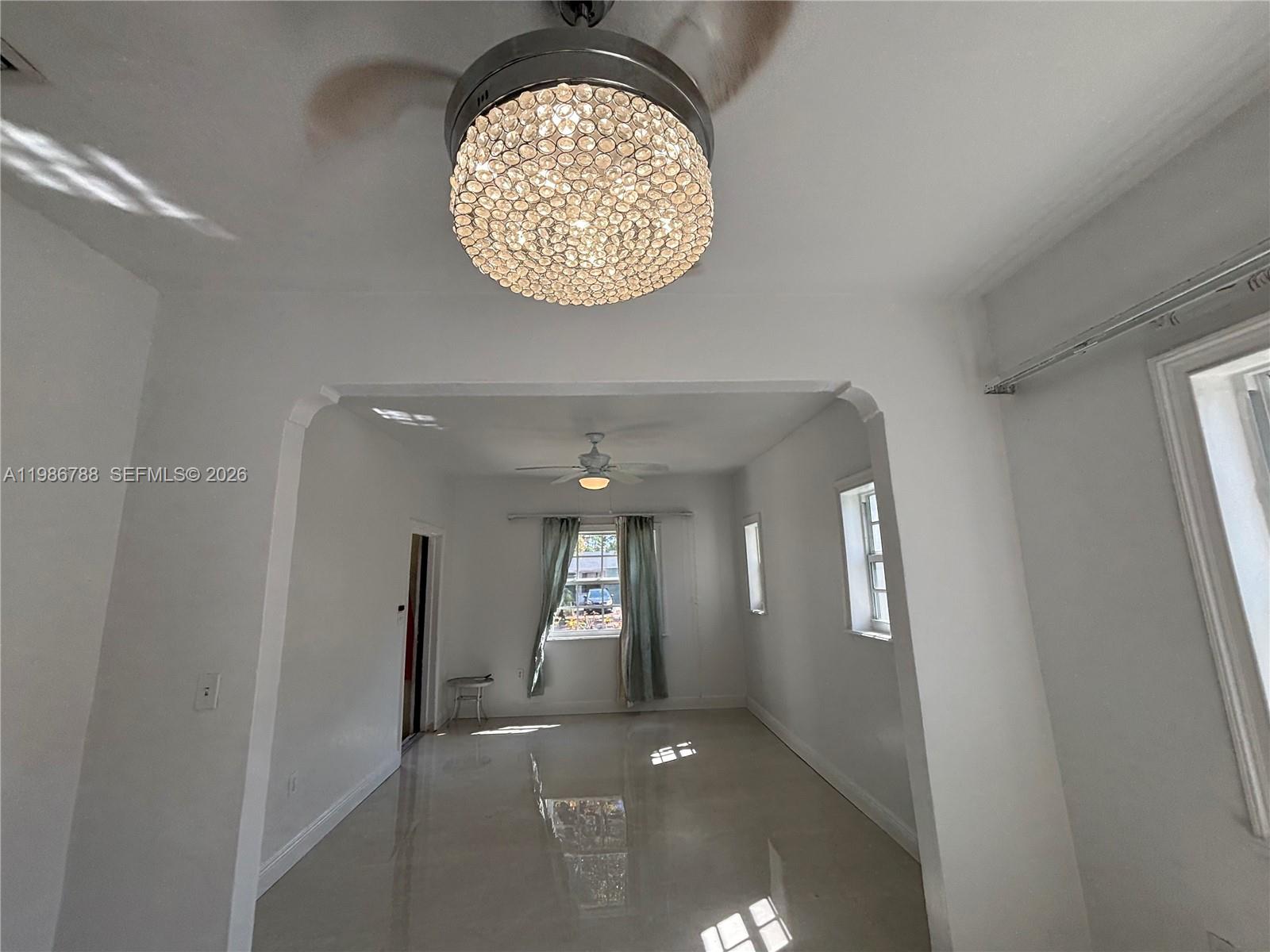 521 Northwest 48th Street Miami, FL 33127 - Photo 11 of 30 en view interior of a house with a window