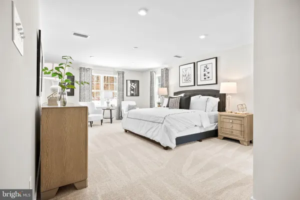 a bathroom with a sink vanity and a mirror