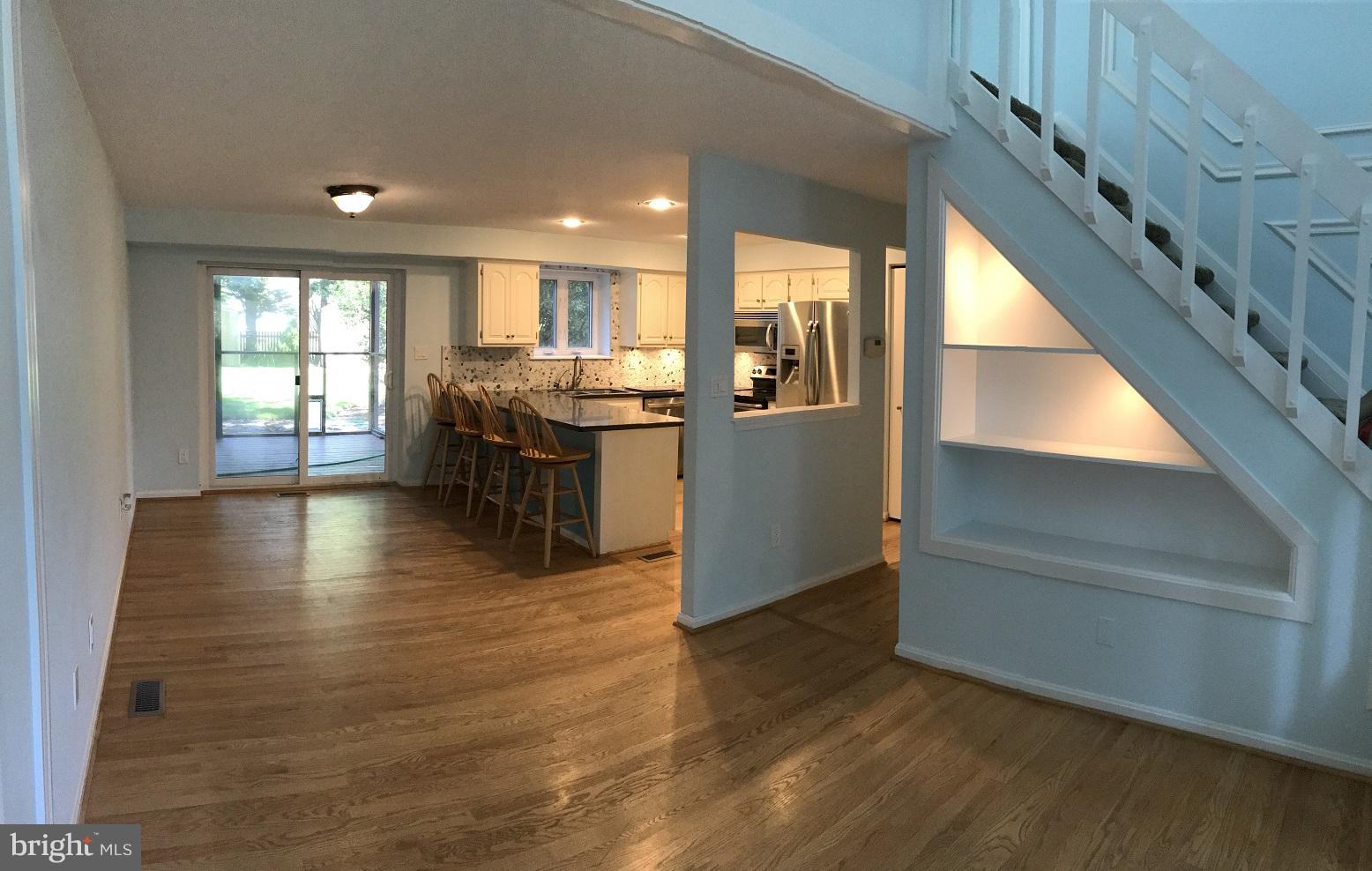 680 Red Cedar Road Annapolis, MD 21409 - Photo 16 of 30 a view of kitchen with furniture and wooden floor