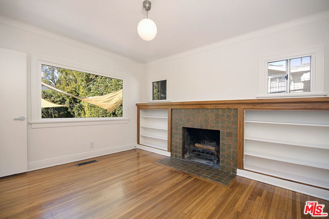 3749 Griffith View Drive Los Angeles, CA 90039 - Photo 14 of 34 a view of an empty room with wooden floor and a window