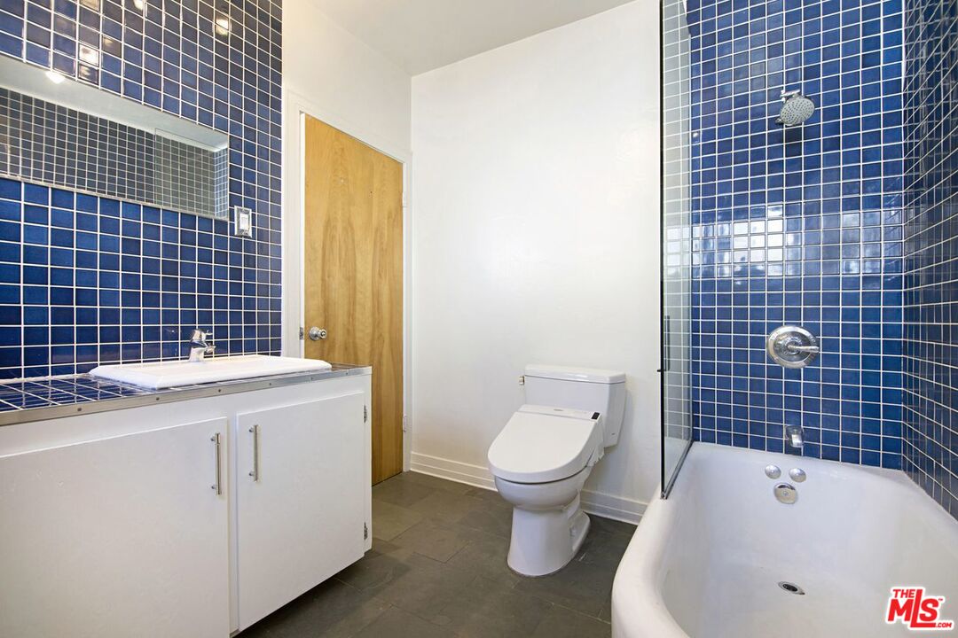 3749 Griffith View Drive Los Angeles, CA 90039 - Photo 15 of 34 a bathroom with a sink toilet and shower