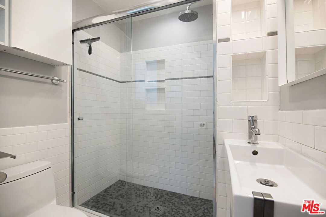 3749 Griffith View Drive Los Angeles, CA 90039 - Photo 28 of 34 a bathroom with a shower and a sink