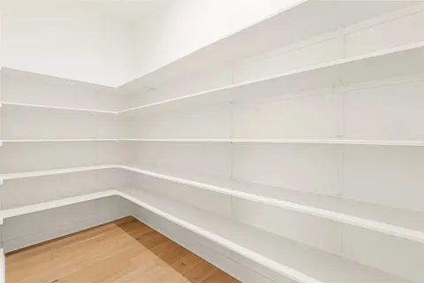 a empty closet with white paint