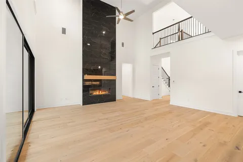 a view of a hallway with stairs