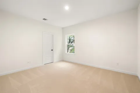a bathroom with a sink toilet and mirror