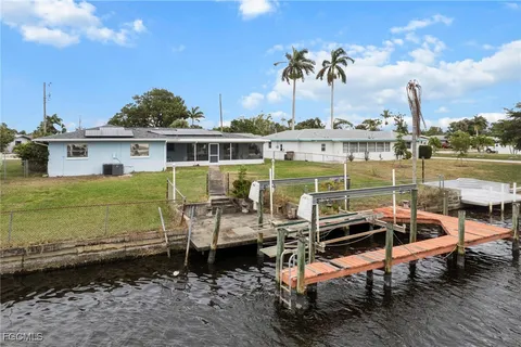 a view of a chairs and table on the deck