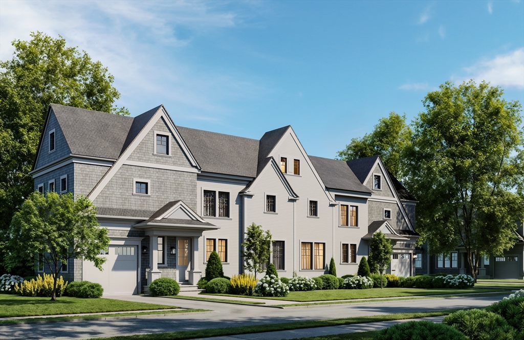 38 Otis Street, Unit 38 Needham, MA 02492 - Photo 1 of 19 a front view of a house with a yard