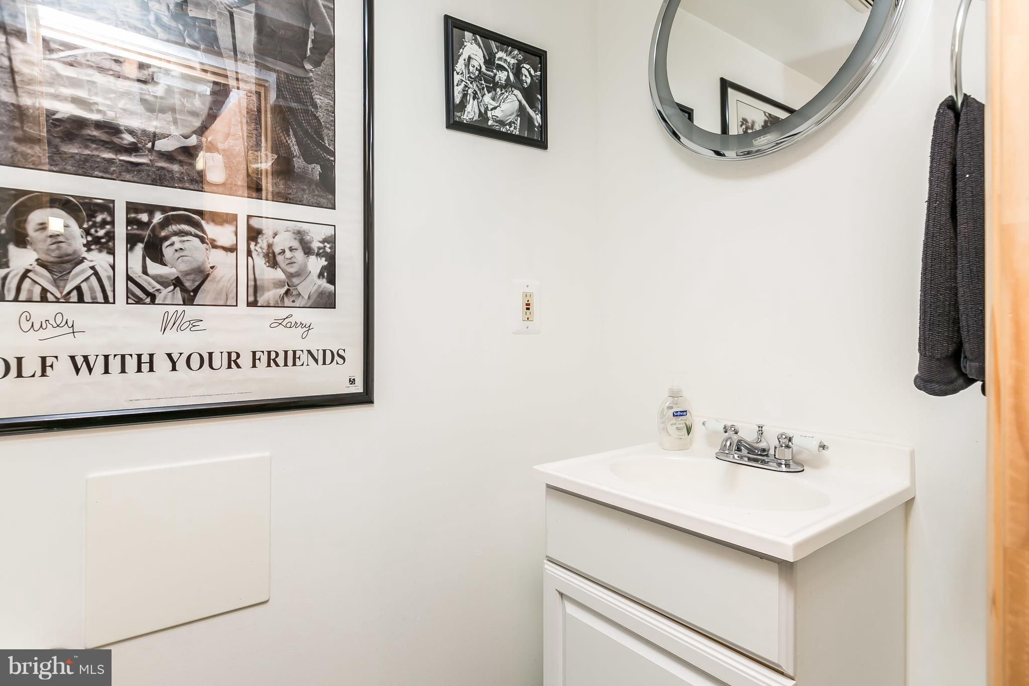 22 Dunvegan Road Baltimore, MD 21228 - Photo 24 of 30 A half Bath completes this remodeled lower level