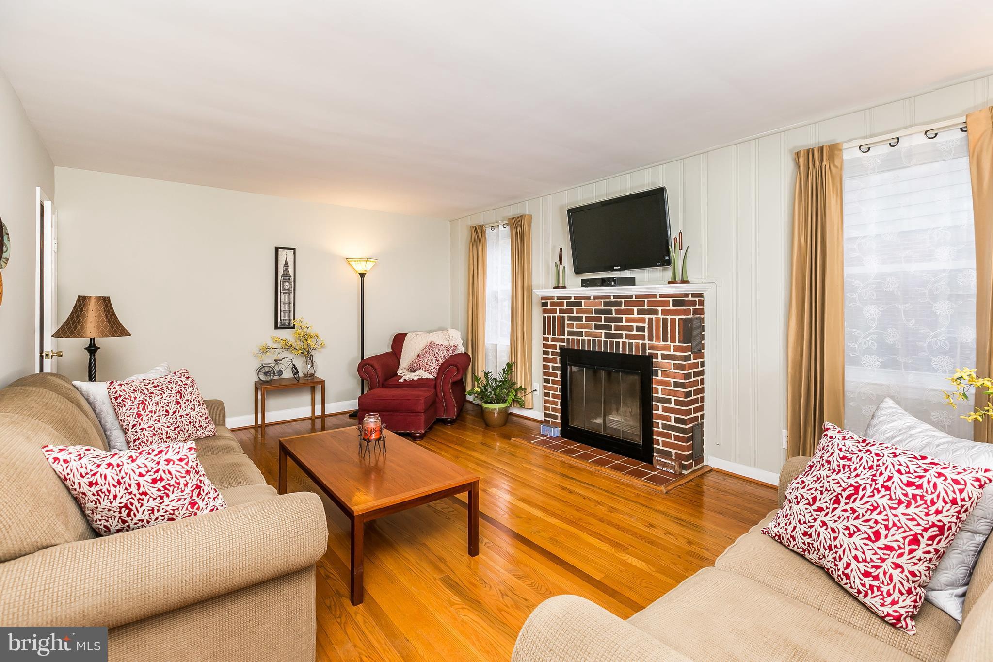 22 Dunvegan Road Baltimore, MD 21228 - Photo 4 of 30 Cozy wood burning fireplace