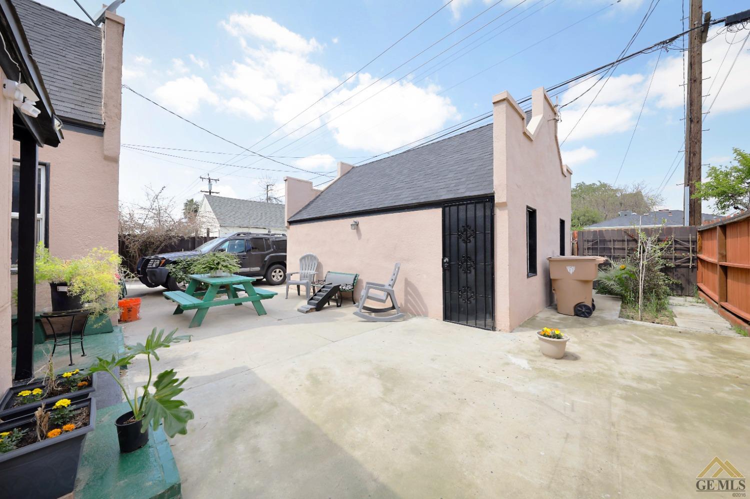 Undisclosed Address Bakersfield, CA 93305 - Photo 22 of 29 a view of a chair and table in the patio