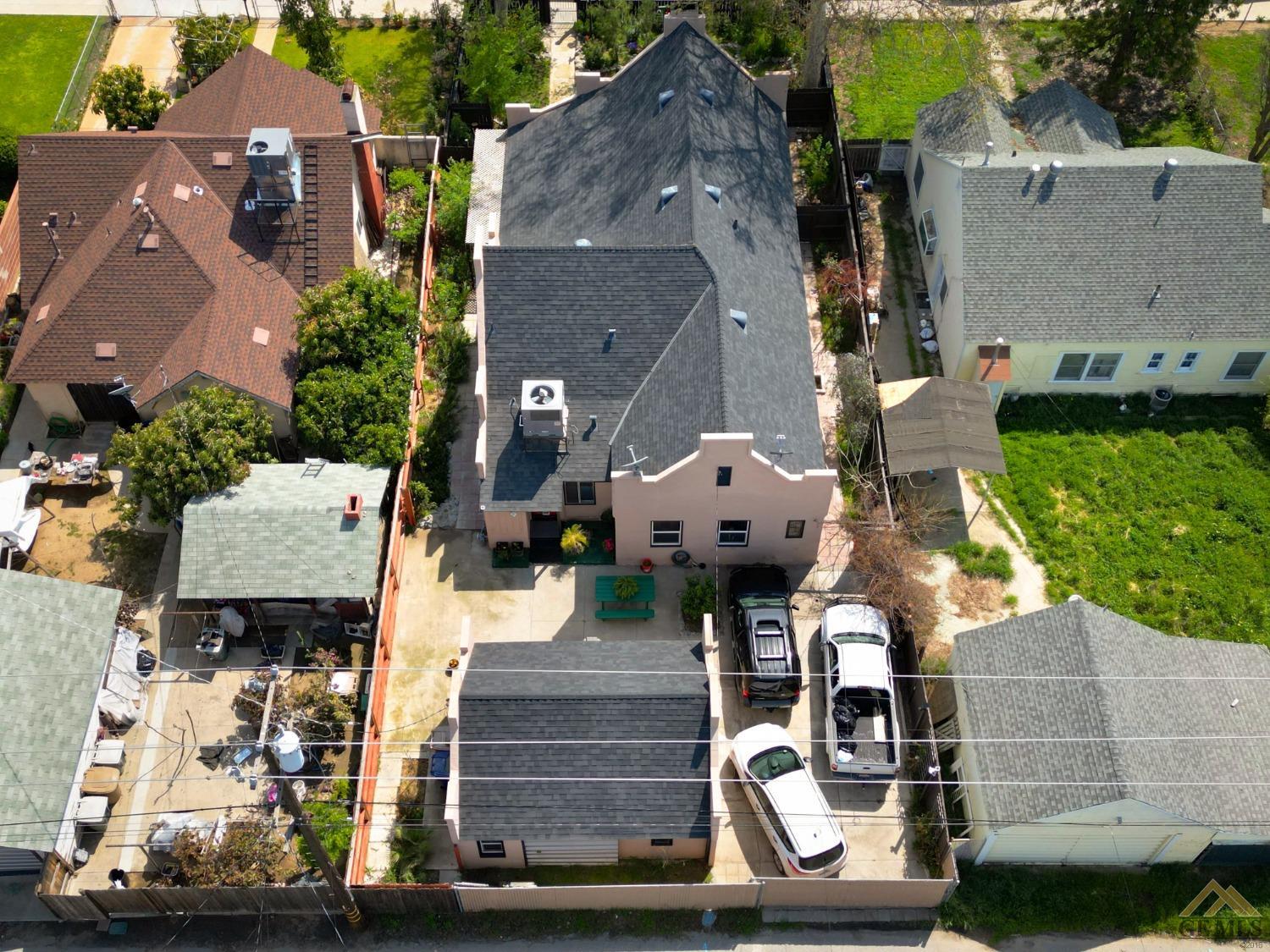 Undisclosed Address Bakersfield, CA 93305 - Photo 28 of 29 an aerial view of a house with large trees and plants