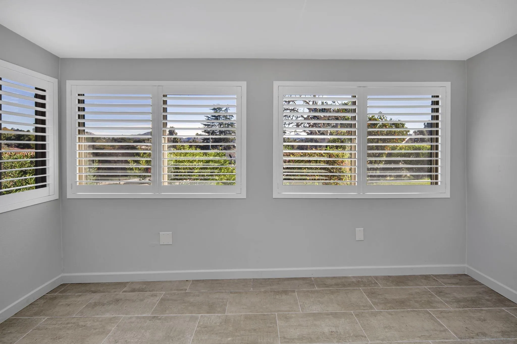 12544 Rios Road San Diego, CA 92128 - Photo 16 of 25 a view of an empty room with a window