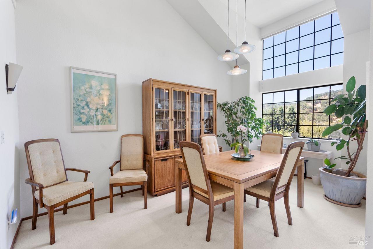 186 Redhawk Road Novato, CA 94949 - Photo 6 of 17 Stunning 2 story windows in the dinning area.