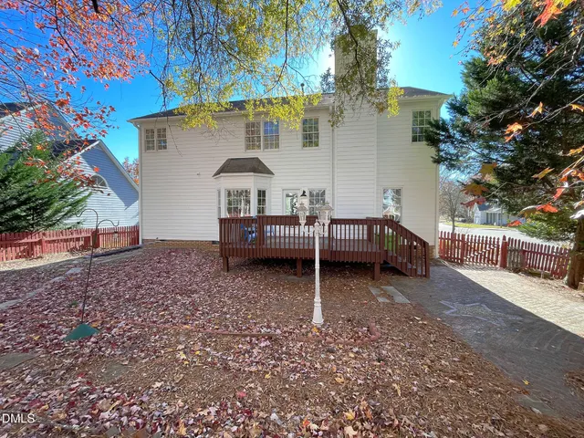 a view of a deck with a yard
