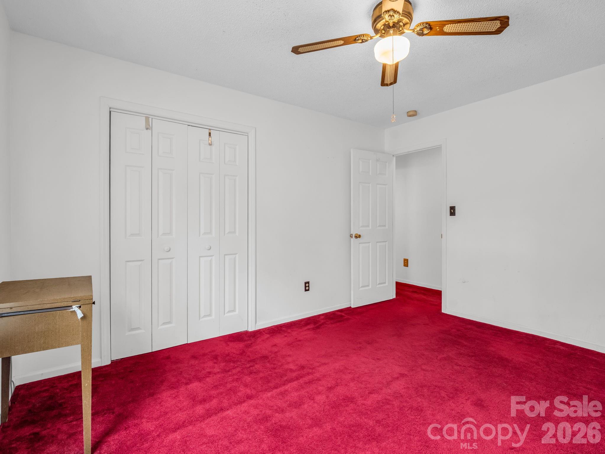 308 Frog Hollow Road Rutherfordton, NC 28139 - Photo 21 of 26 a view of a bedroom with a ceiling fan