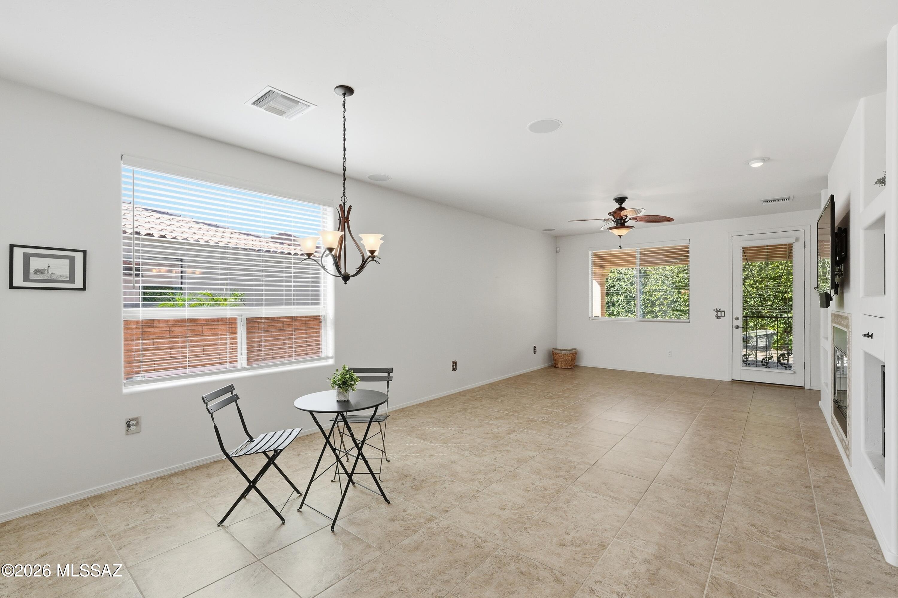 2845 North Vactor Ranch Place Tucson, AZ 85715 - Photo 5 of 41 Dining & Living Room - Opens to back patio