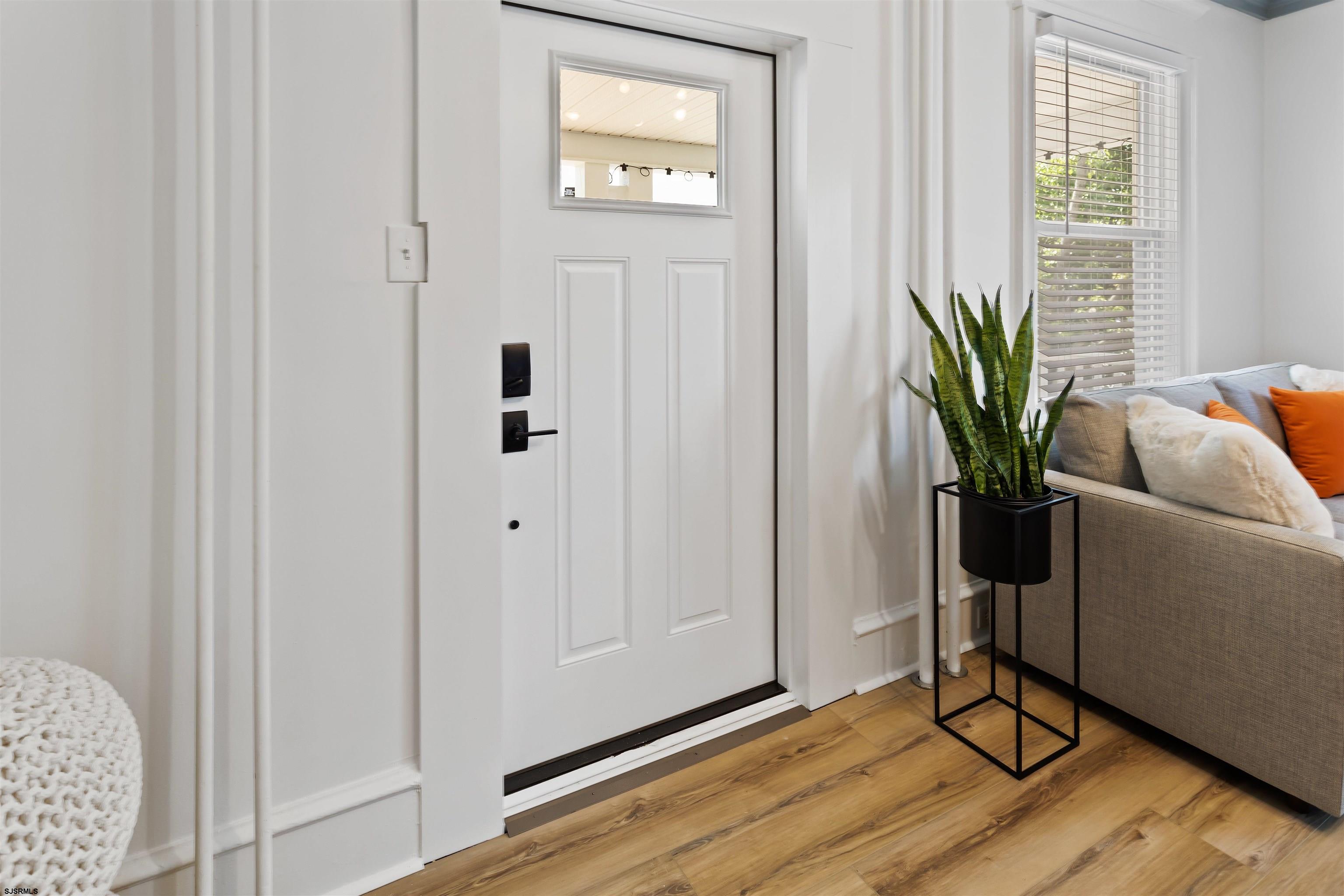 1 South Delancy Place, Unit 1 Atlantic City, NJ 08401 - Photo 17 of 35 a view of entryway with wooden floor