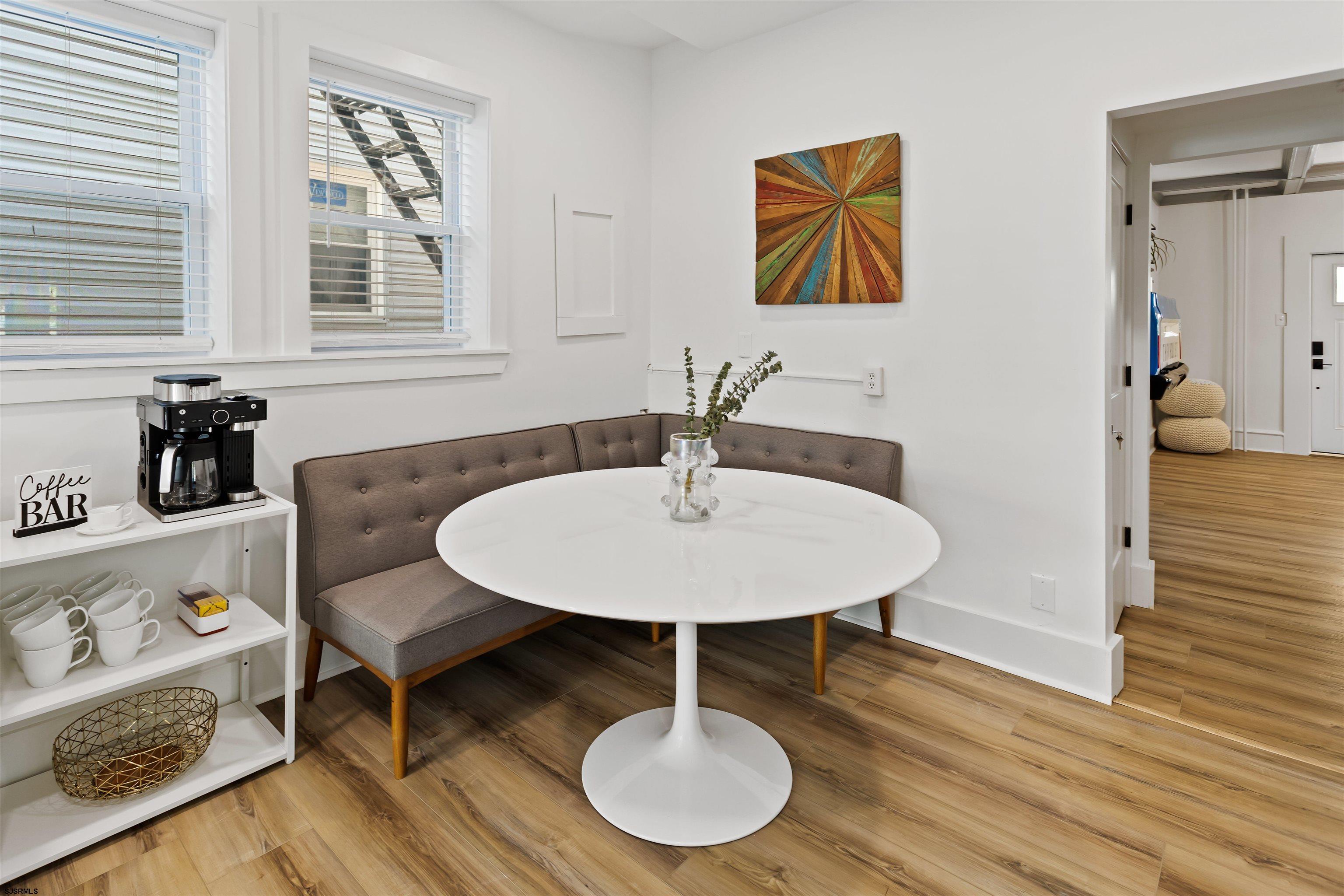 1 South Delancy Place, Unit 1 Atlantic City, NJ 08401 - Photo 22 of 35 a dining room with furniture and wooden floor