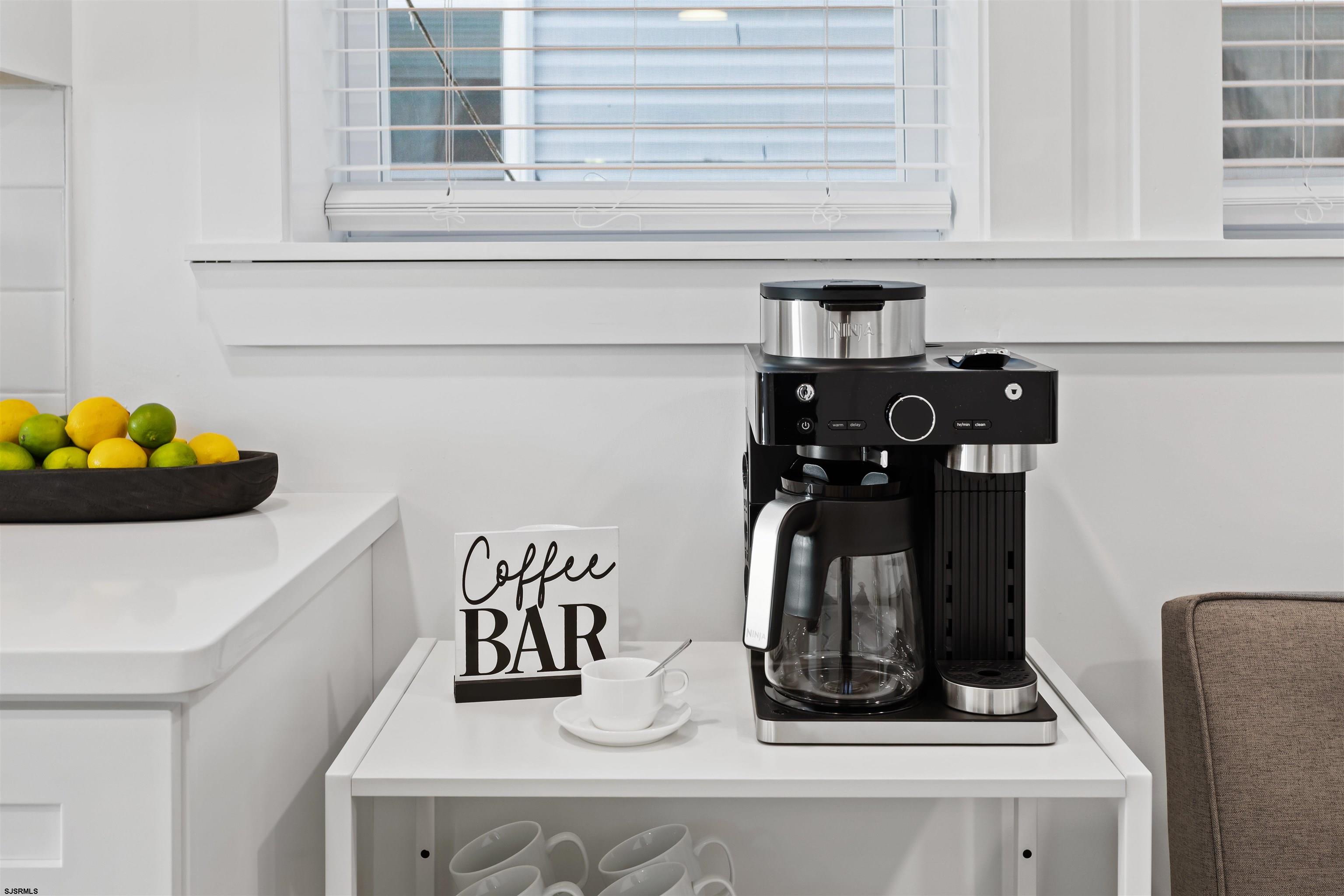 1 South Delancy Place, Unit 1 Atlantic City, NJ 08401 - Photo 34 of 35 a kitchen with a refrigerator and cabinets