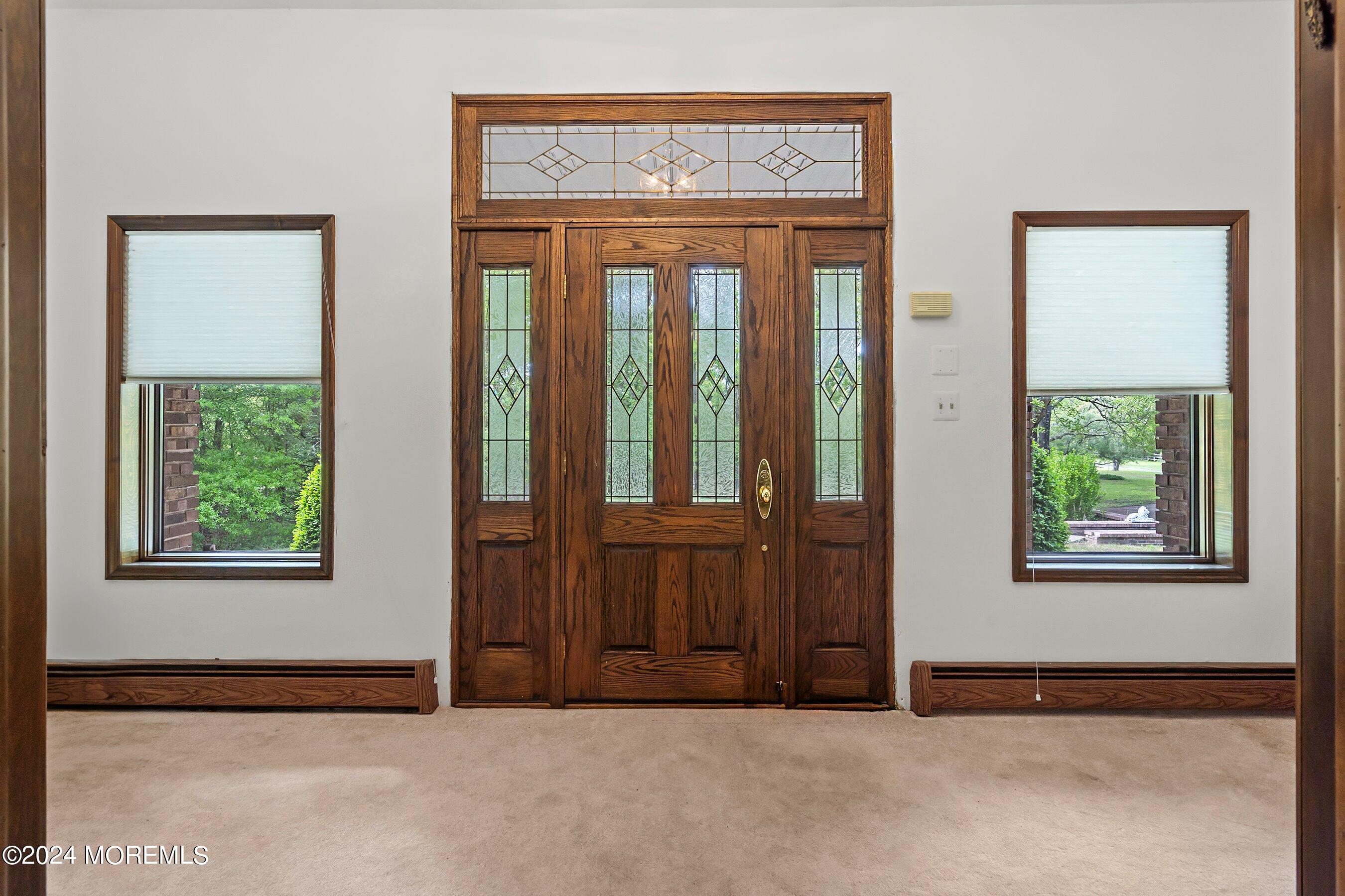859 Monmouth Road Cream Ridge, NJ 08514 - Photo 12 of 50 a view of an empty room with a window