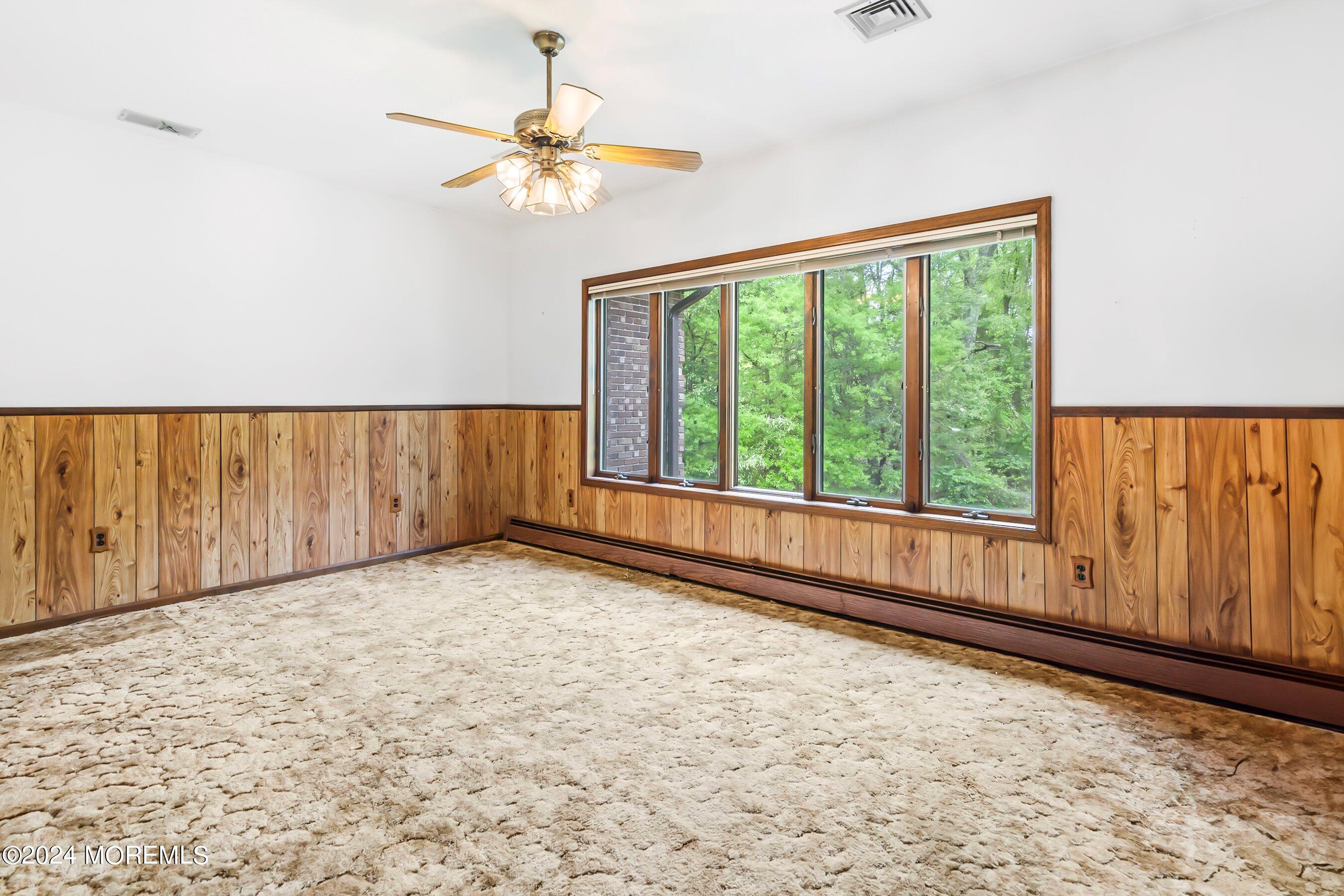 859 Monmouth Road Cream Ridge, NJ 08514 - Photo 18 of 50 a view of an empty room with a window