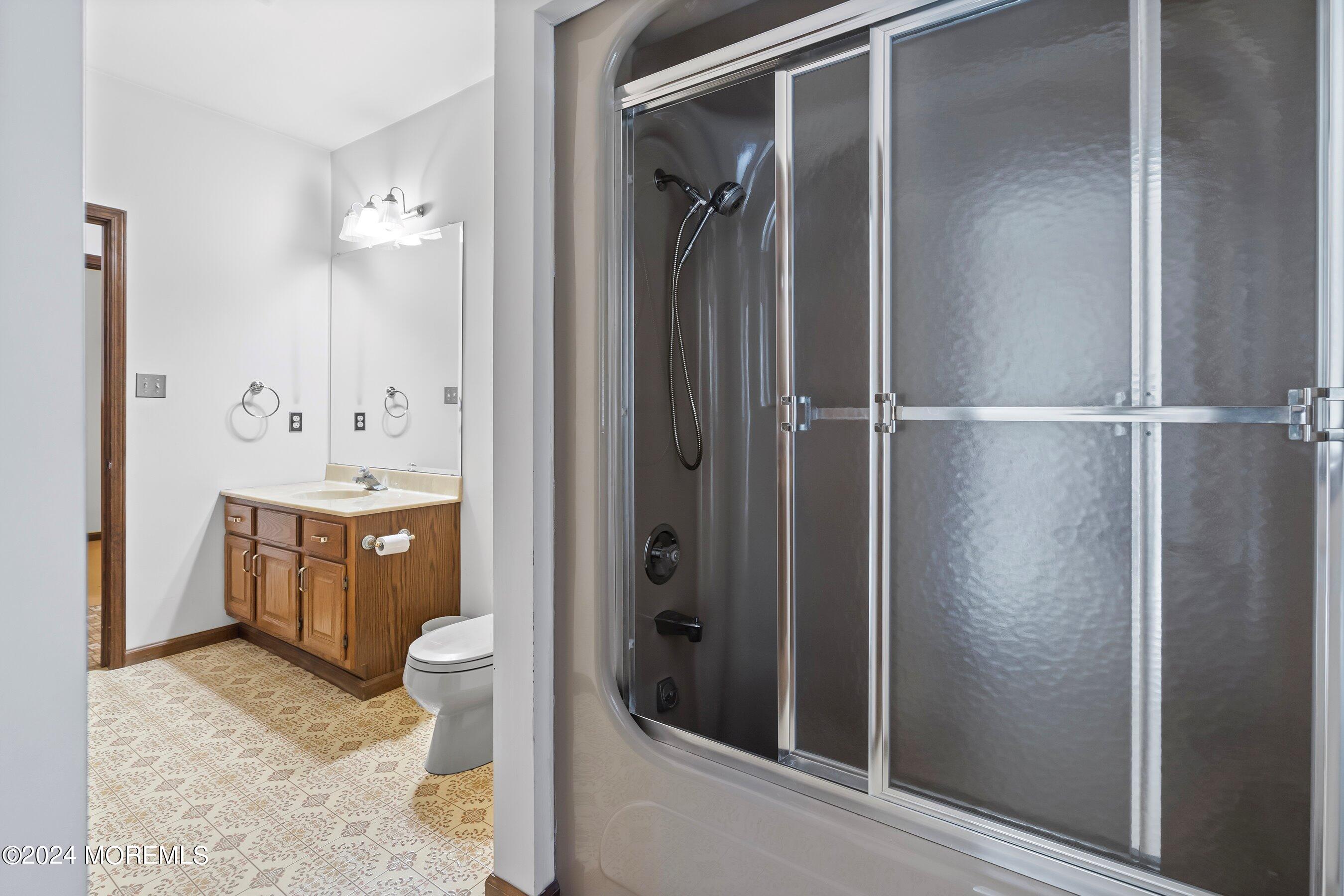 859 Monmouth Road Cream Ridge, NJ 08514 - Photo 33 of 50 a bathroom with a sink and mirror