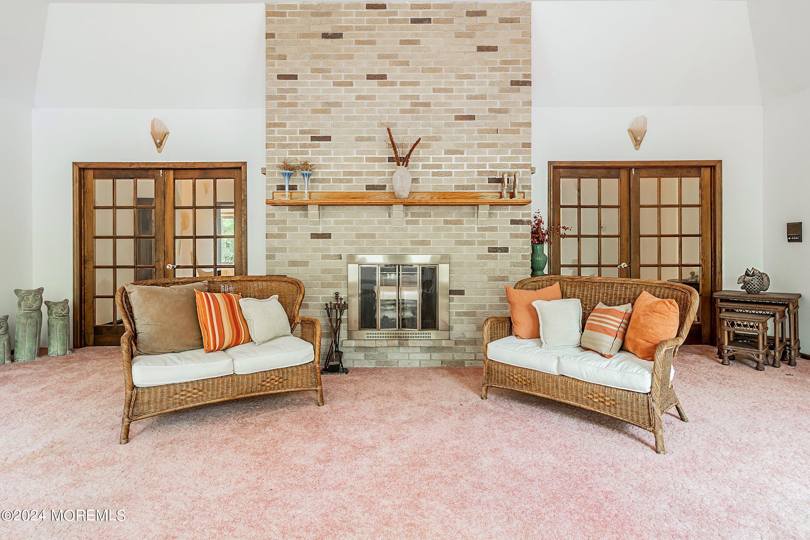 859 Monmouth Road Cream Ridge, NJ 08514 - Photo 4 of 50 a living room with fireplace furniture and floor to ceiling window