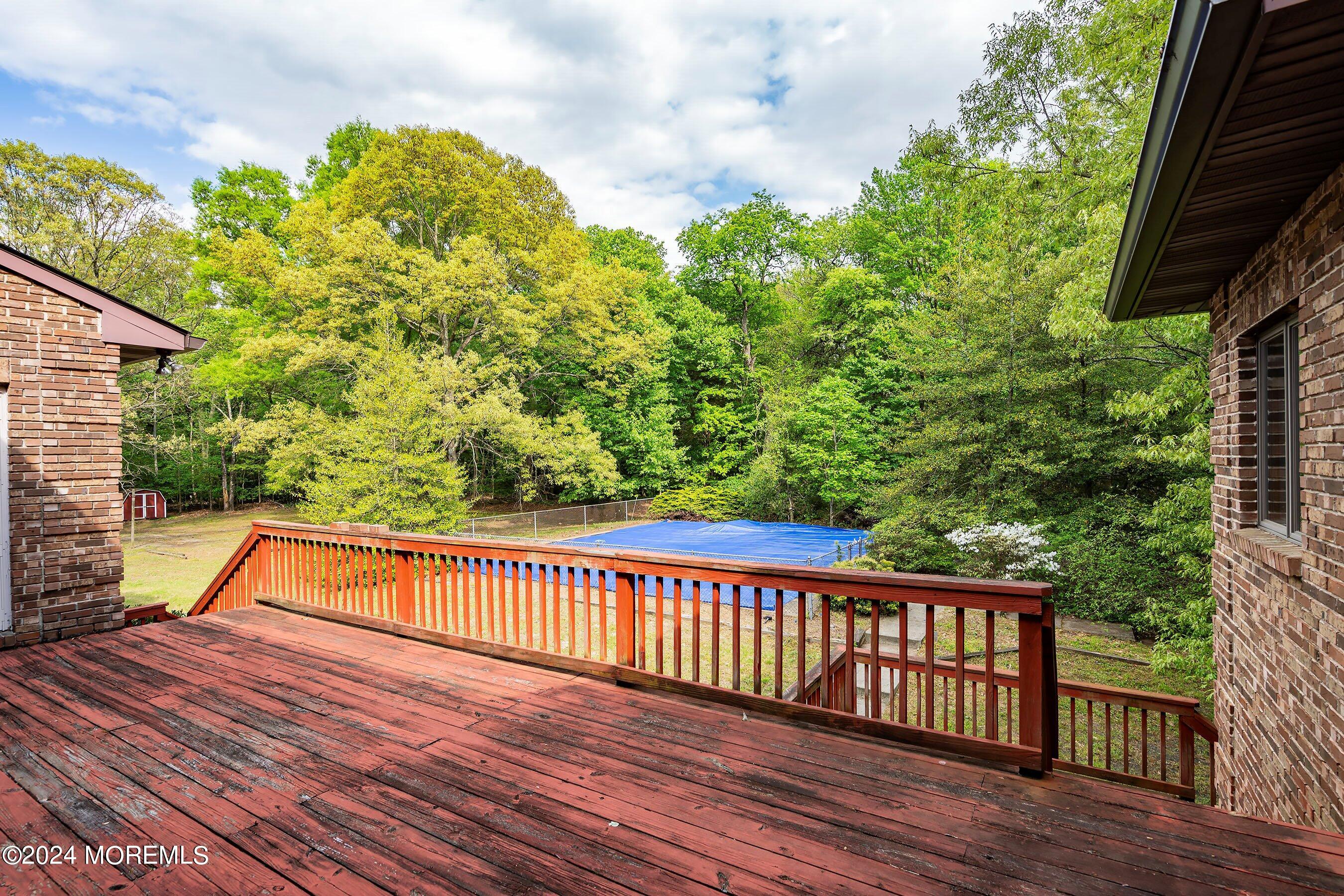 859 Monmouth Road Cream Ridge, NJ 08514 - Photo 45 of 50 a view of a balcony with wooden floor