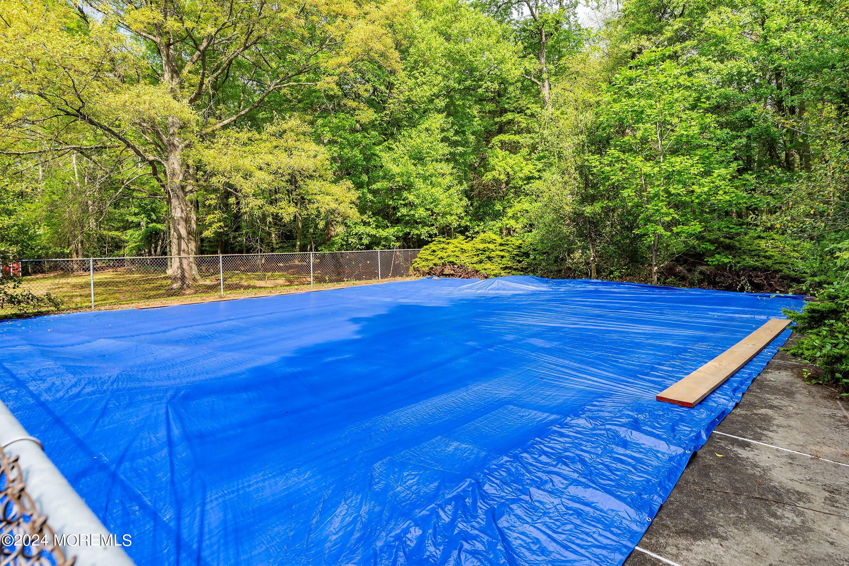 859 Monmouth Road Cream Ridge, NJ 08514 - Photo 46 of 50 a view of a swimming pool with an outdoor space
