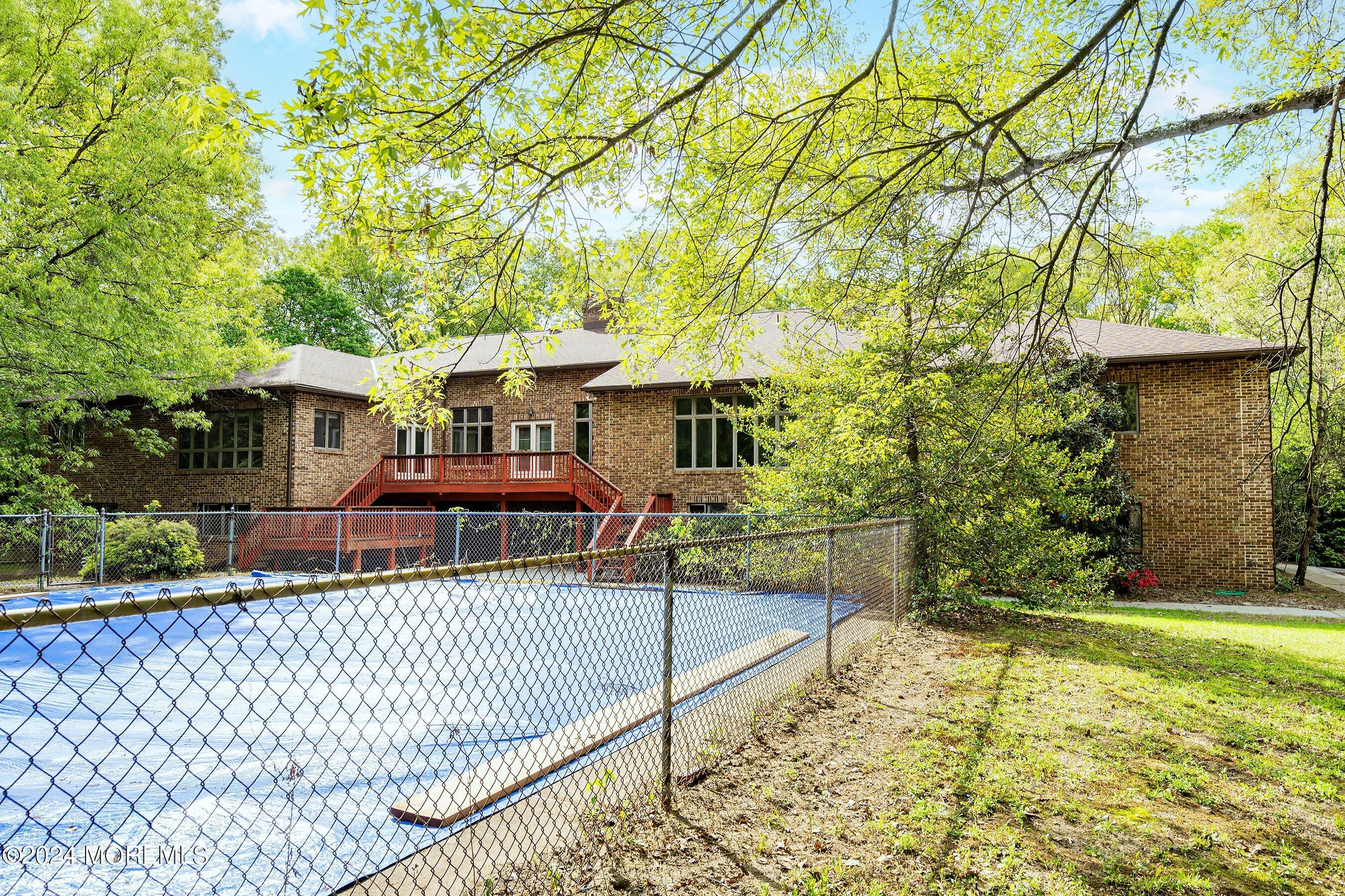 859 Monmouth Road Cream Ridge, NJ 08514 - Photo 47 of 50 a front view of a house with a yard