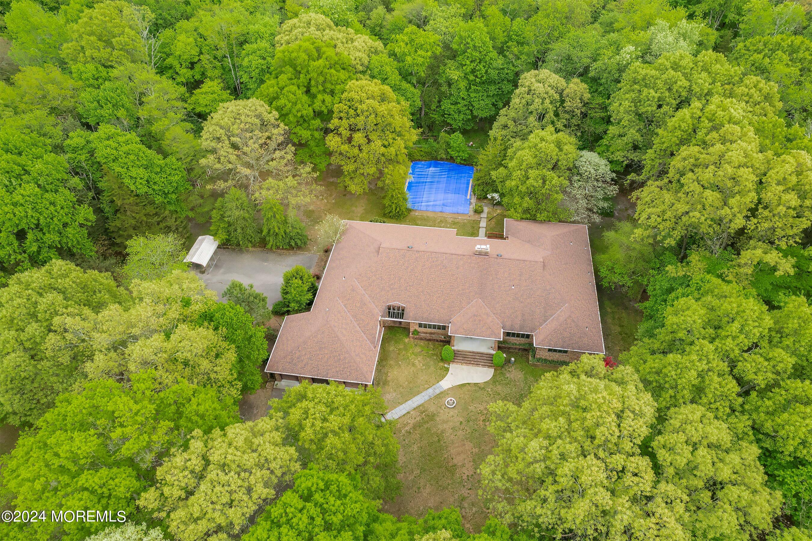 859 Monmouth Road Cream Ridge, NJ 08514 - Photo 49 of 50 an aerial view of a house with yard swimming pool and outdoor seating