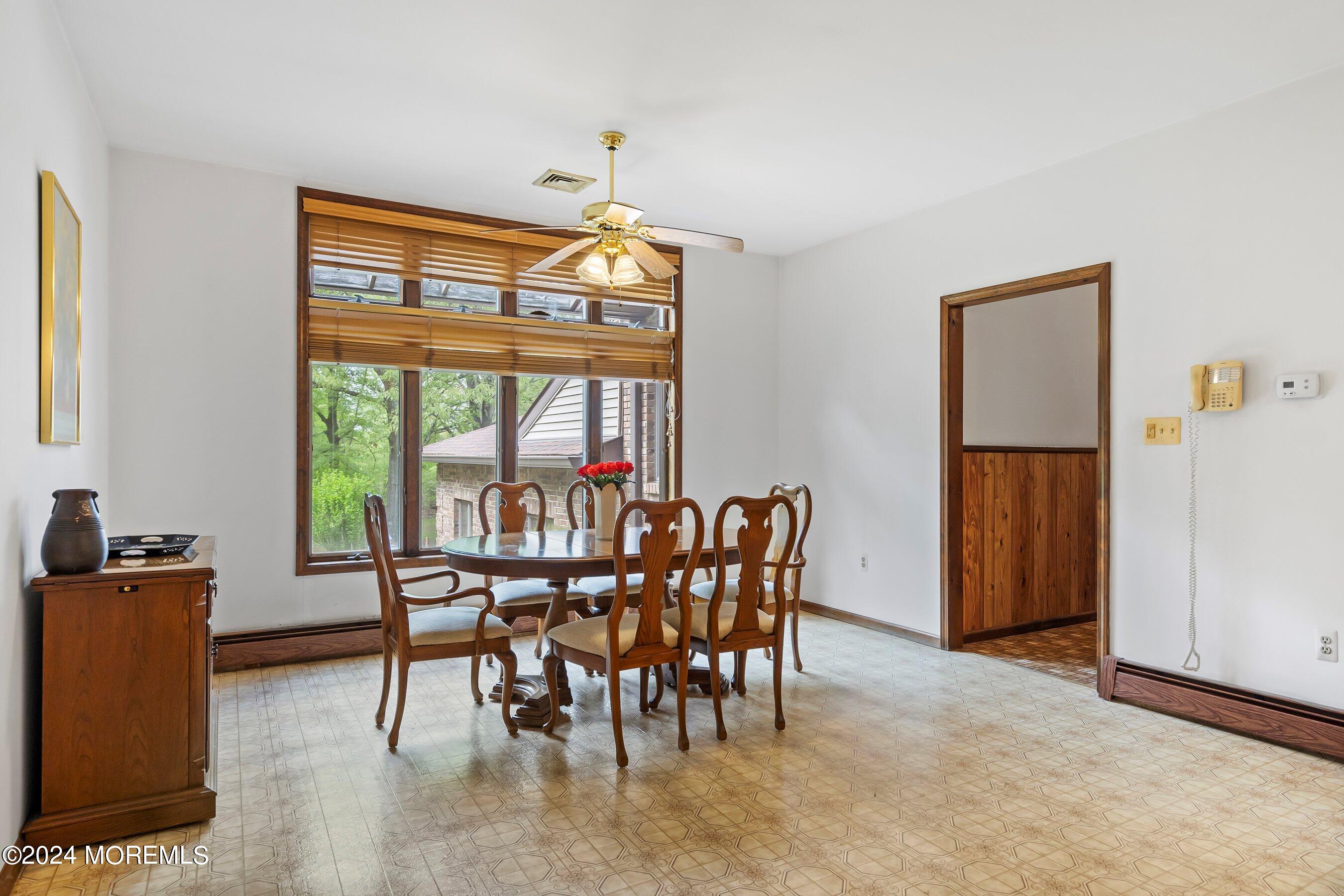 859 Monmouth Road Cream Ridge, NJ 08514 - Photo 8 of 50 a view of a dining room with furniture window and outside view