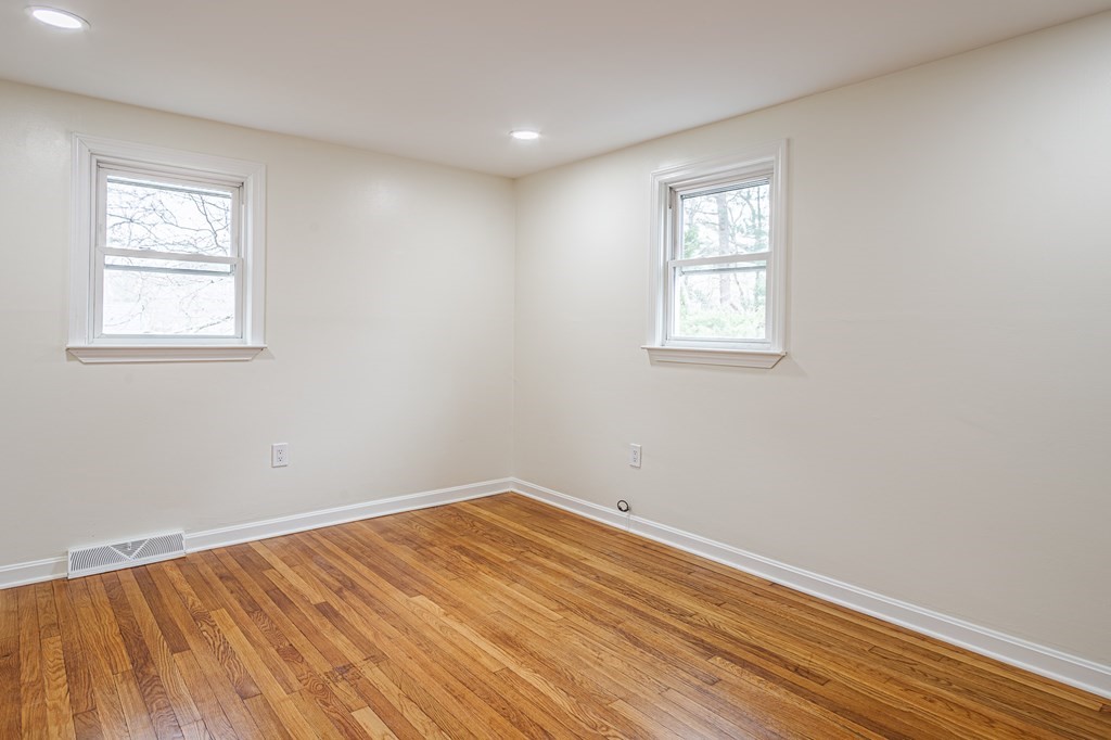 39 Kalmia Road Holbrook, MA 02343 - Photo 17 of 32 an empty room with a window