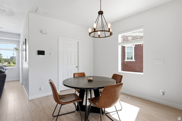 862 Founders Point Lane South Midvale, UT 84047 - Photo 13 of 45 Wood-finish flooring with crisp white walls and trim