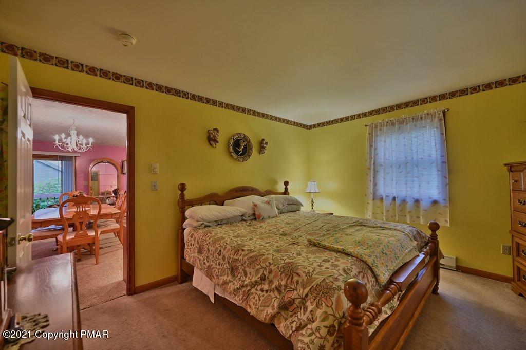 1607 Cotswald Road Tobyhanna, PA 18466 - Photo 19 of 61 a bedroom with a bed and a dresser