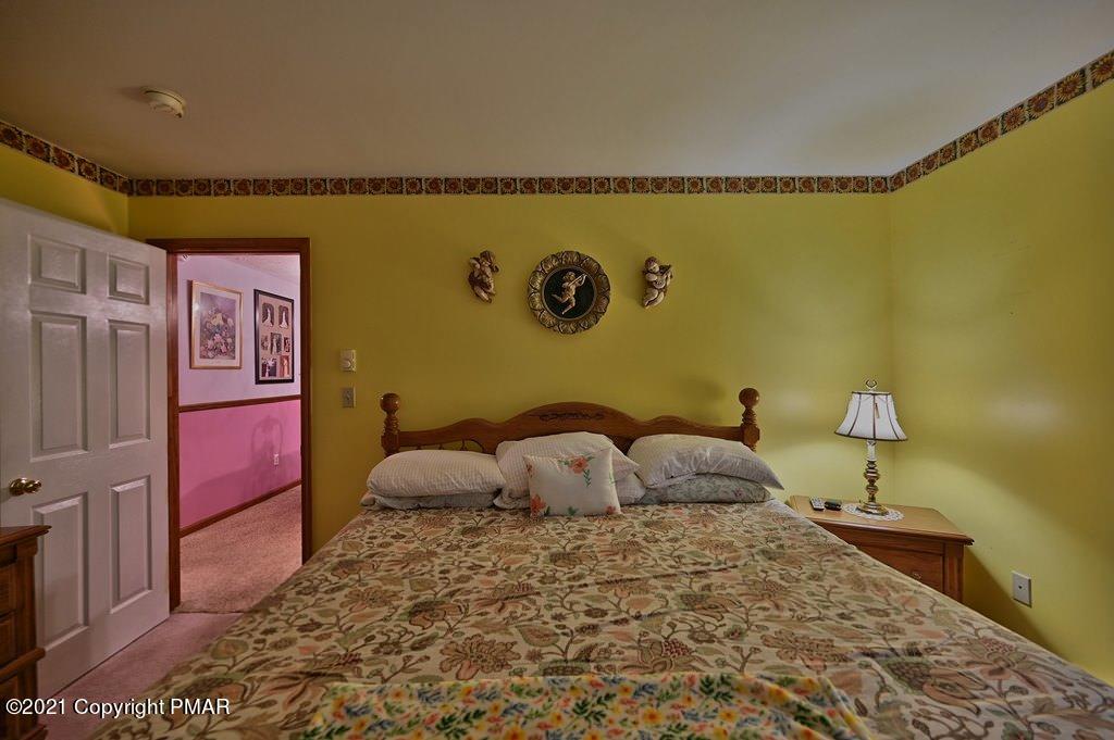 1607 Cotswald Road Tobyhanna, PA 18466 - Photo 20 of 61 a bedroom with a bed and teddy bear on bed