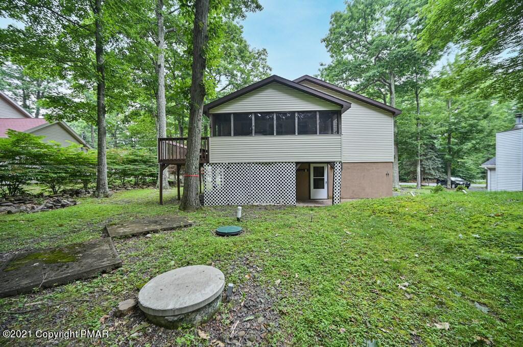 1607 Cotswald Road Tobyhanna, PA 18466 - Photo 53 of 61 a view of a house with a backyard