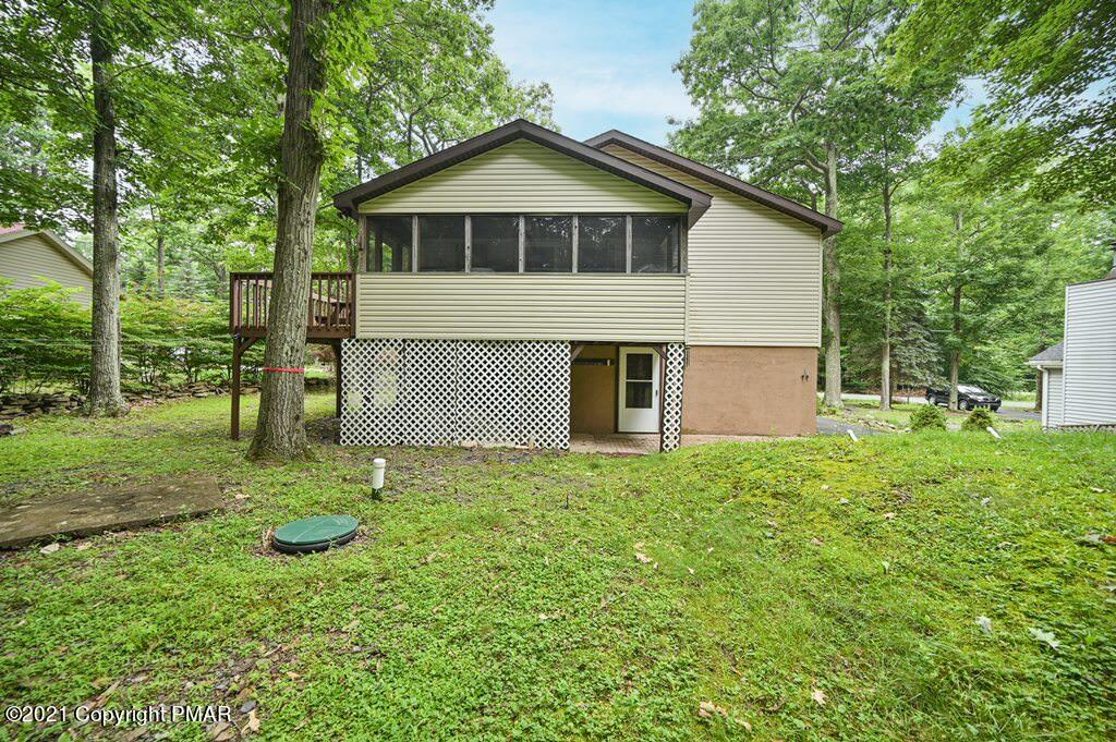 1607 Cotswald Road Tobyhanna, PA 18466 - Photo 54 of 61 a yellow and red house with a yard