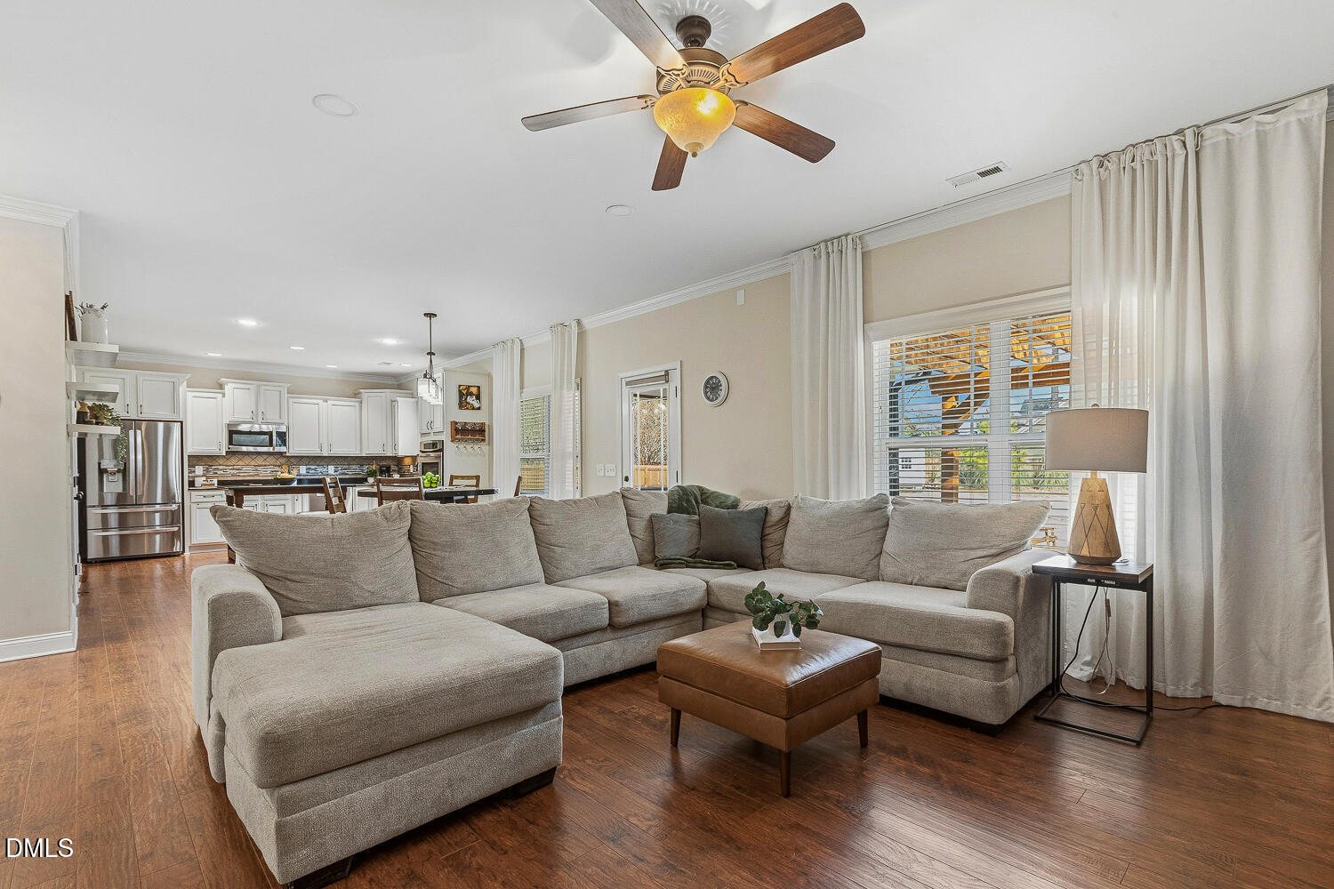 5933 Rounder Lane Holly Springs, NC 27540 - Photo 14 of 45 a living room with furniture and a large window