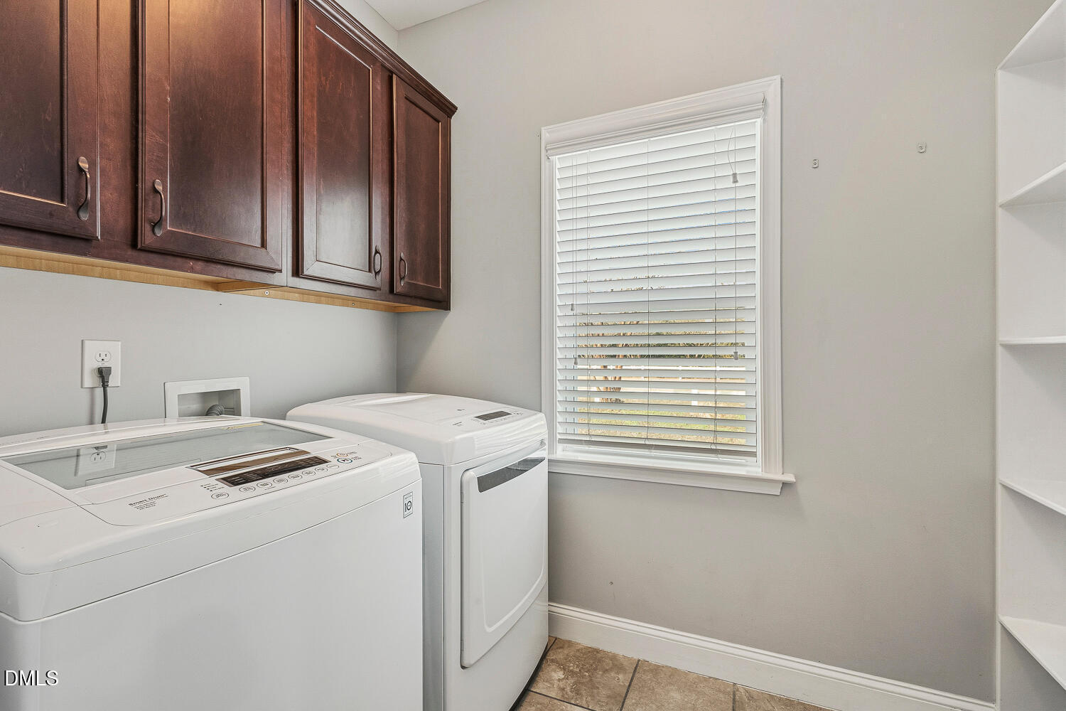 5933 Rounder Lane Holly Springs, NC 27540 - Photo 18 of 45 a utility room with dryer and washer