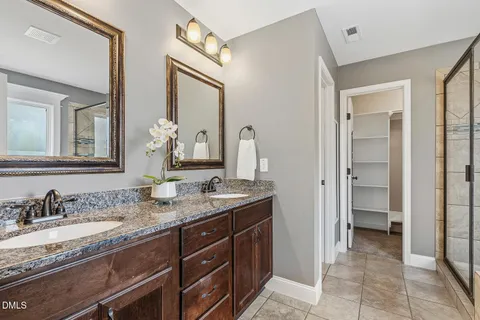 a bathroom with a tub and shower