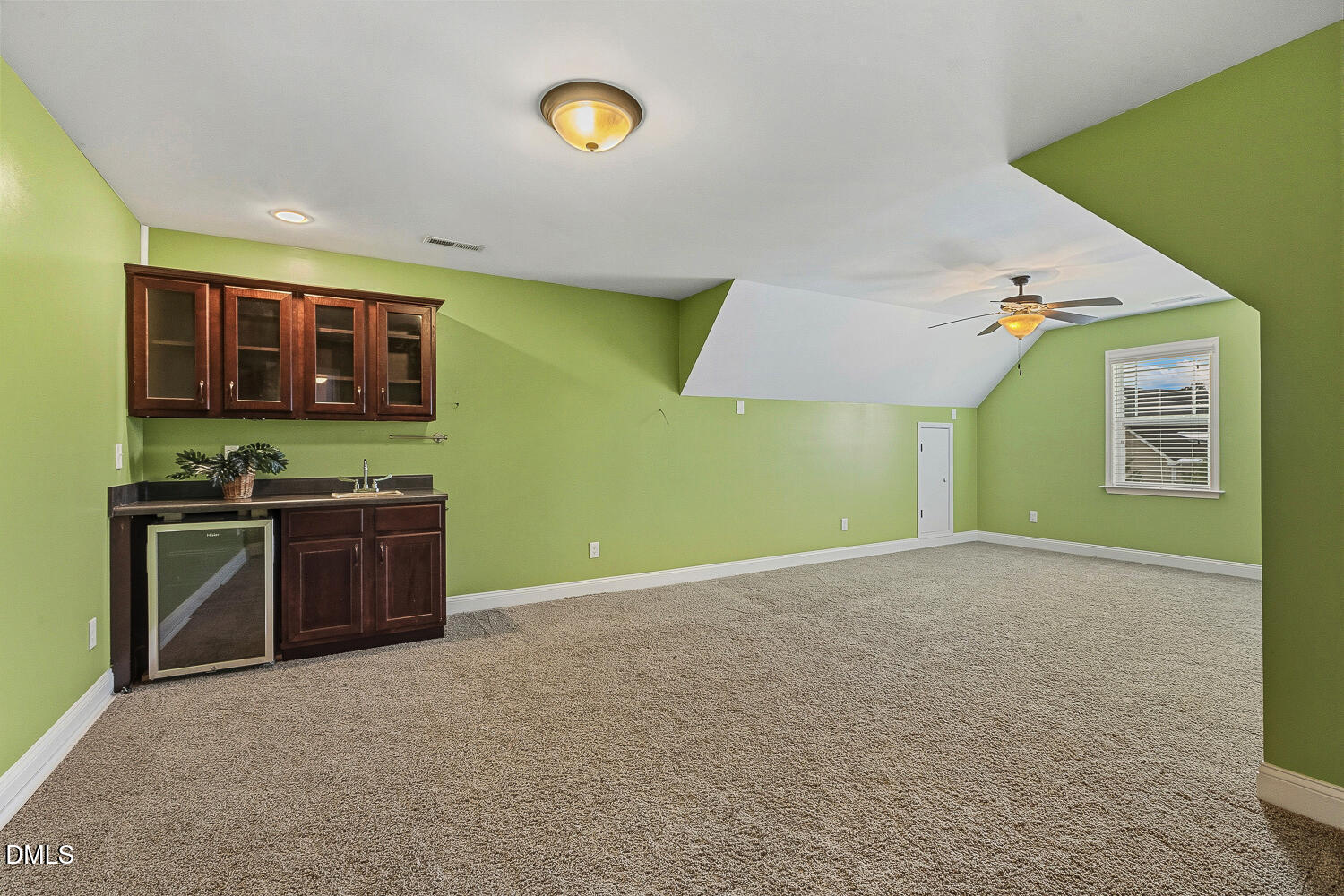 5933 Rounder Lane Holly Springs, NC 27540 - Photo 33 of 45 a view of a kitchen with a sink and a stove top oven