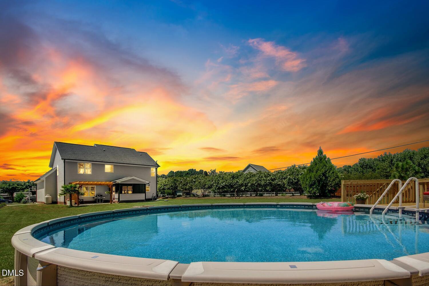5933 Rounder Lane Holly Springs, NC 27540 - Photo 42 of 45 a view of swimming pool with a yard