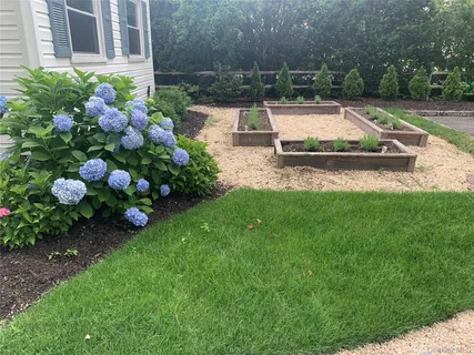 a view of yard with swimming pool