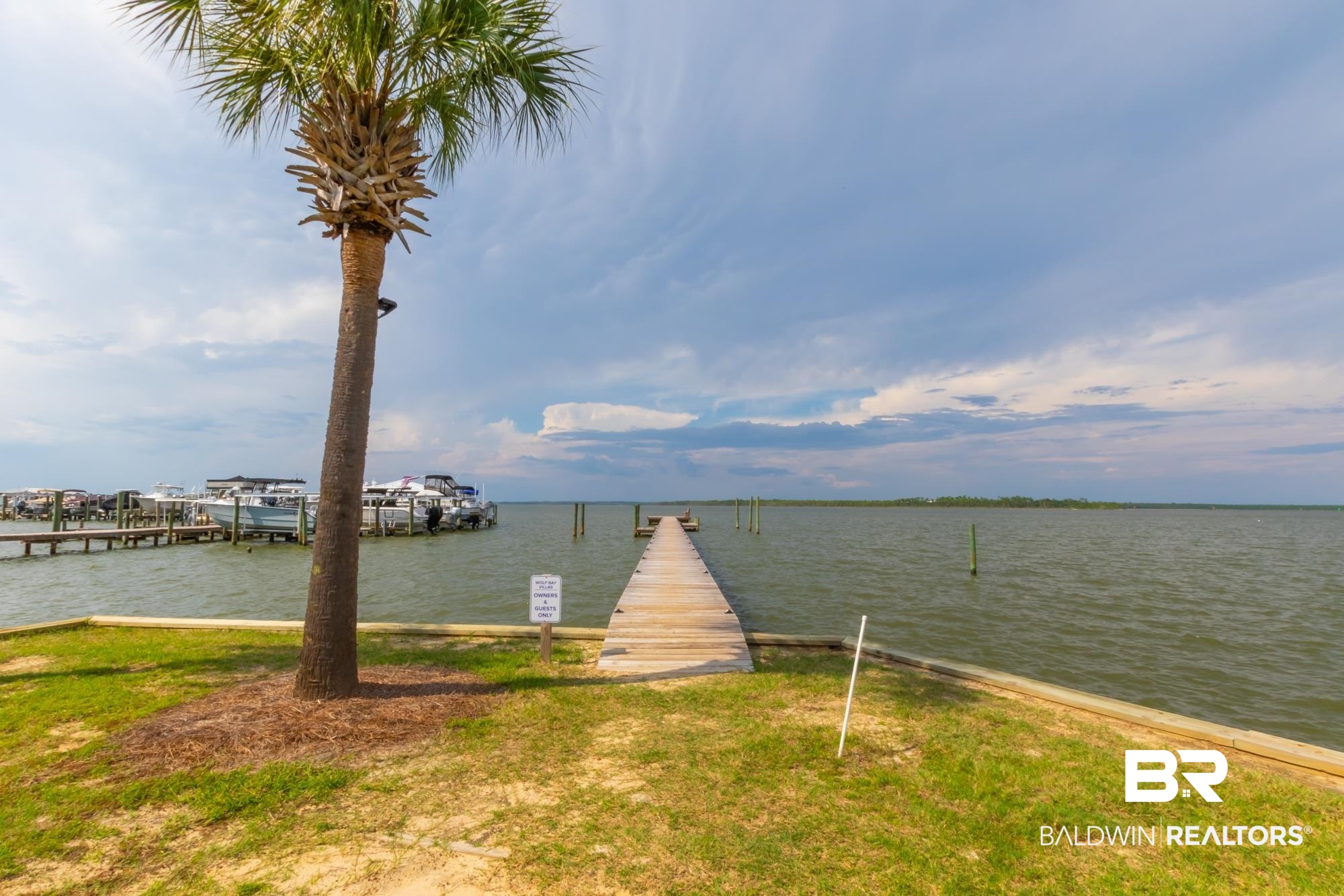 25925 -C Canal Road, Unit 203 Orange Beach, AL 36561 - Photo 51 of 57 View of water feature with a boat dock