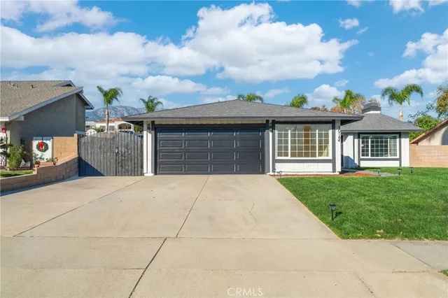 a front view of a house with a garage