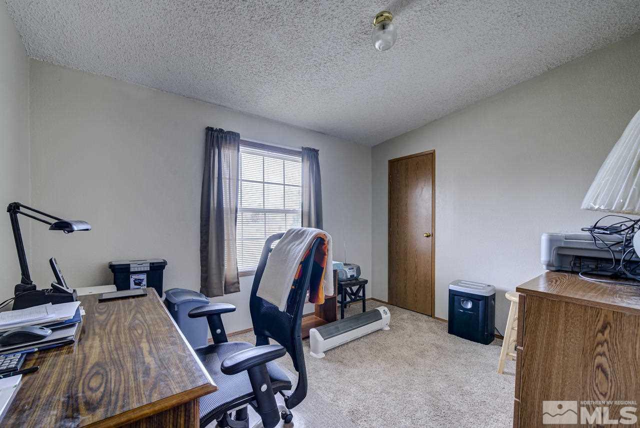 600 Theobald Reno, NV 89521 - Photo 17 of 25 a view of a workspace with furniture and a window