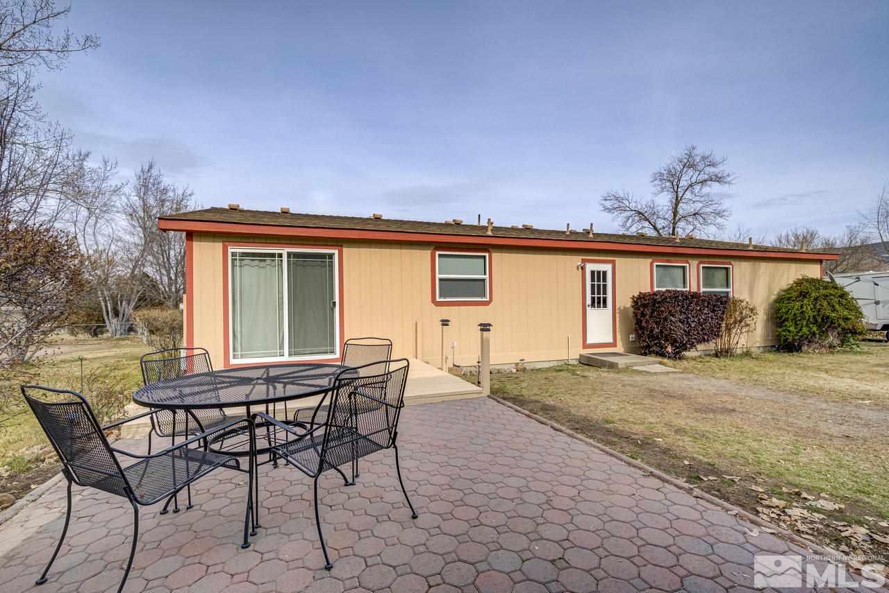 600 Theobald Reno, NV 89521 - Photo 19 of 25 a view of a house with backyard and sitting area